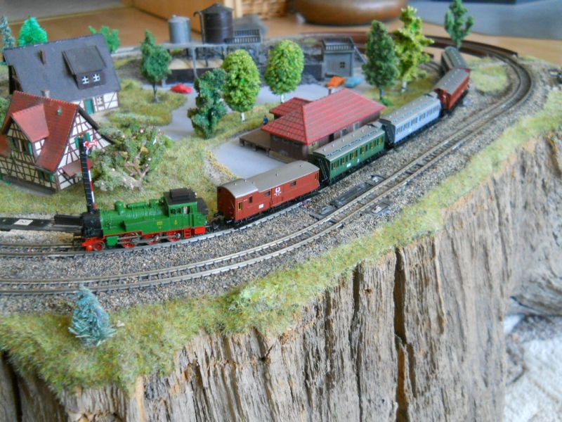 Preussen steam passenger train  on wooden root track